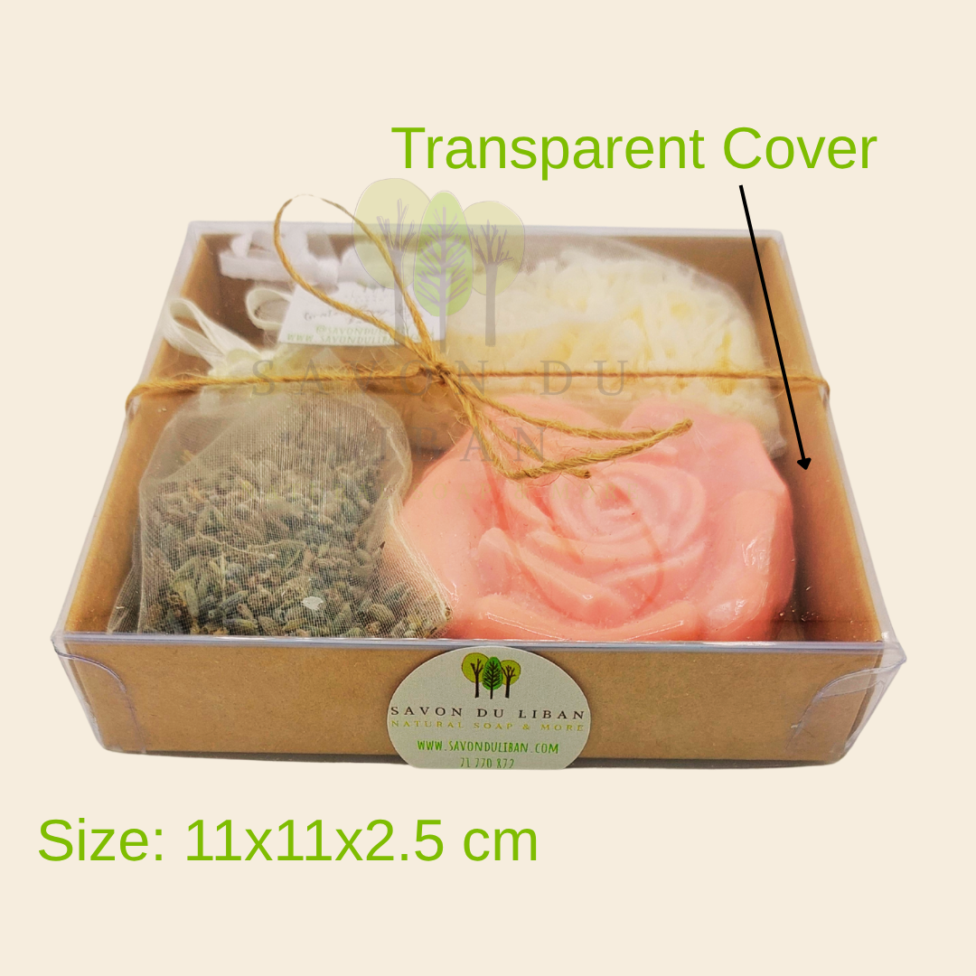 Scentful Sensation, a thoughtful kraft gift box (11 x 11 x 2.5 cm with transparent cover) with 1 soap flower, 1 lavender buds bag, 1 grated soap bag. Handmade in Lebanon.