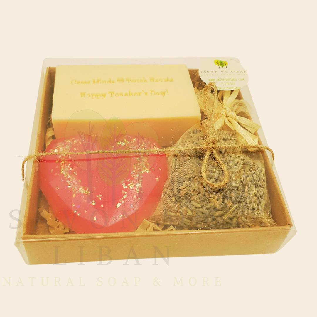 Teacher’s Relax & Enjoy Set – Stamped soap 'Grow Minds ❤️ Touch Hearts - Happy Teacher's Day!', heart soap, and lavender bag in a 11x11x2.5 cm craft box with transparent cover.