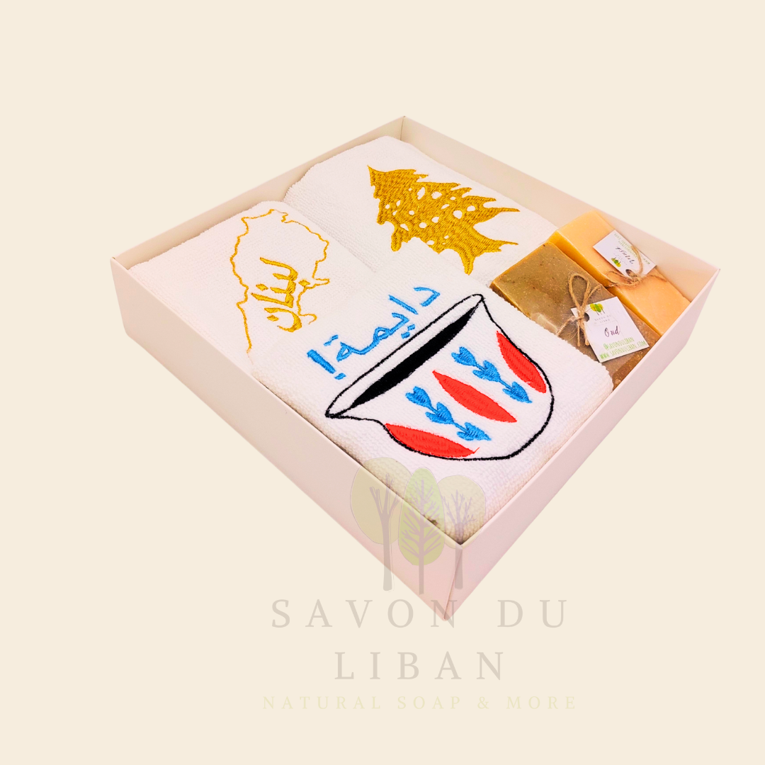 Good Morning from Lebanon – cultural gift set including embroidered towels with Cedar Tree, Lebanon Map, and Coffee Cup Motifs and 2 Handmade Soap Bars in a square white box with transparent lid.