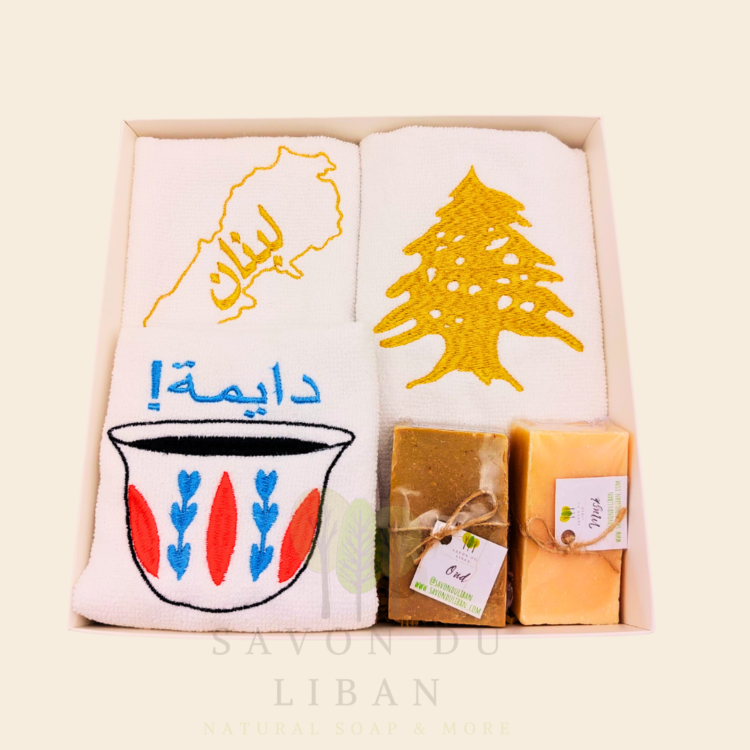 Good Morning from Lebanon – cultural gift set including embroidered towels with Cedar Tree, Lebanon Map, and Coffee Cup Motifs and 2 Handmade Soap Bars in a square white box with transparent lid.