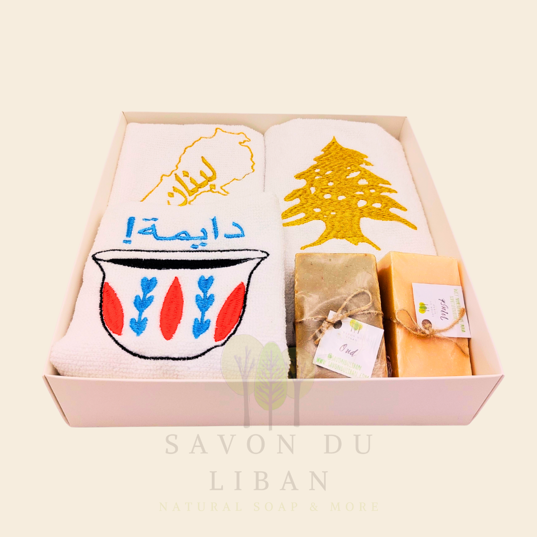 Good Morning from Lebanon – cultural gift set including embroidered towels with Cedar Tree, Lebanon Map, and Coffee Cup Motifs and 2 Handmade Soap Bars in a square white box with transparent lid.