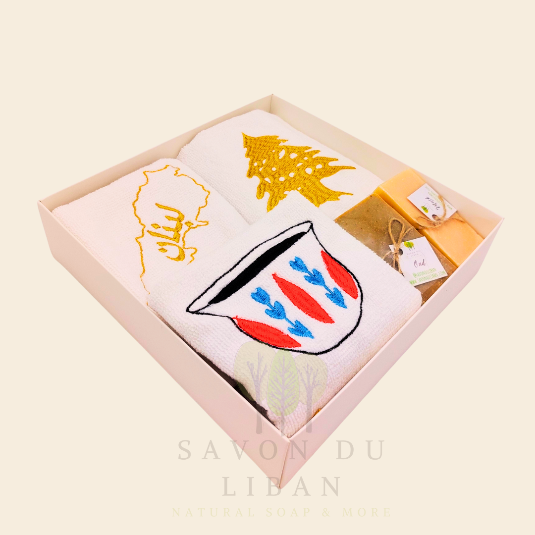 Good Morning from Lebanon – cultural gift set including embroidered towels with Cedar Tree, Lebanon Map, and Coffee Cup Motifs and 2 Handmade Soap Bars in a square white box with transparent lid.