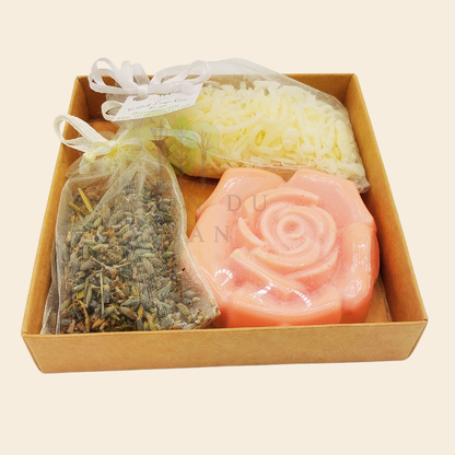 Scentful Sensation, a thoughtful kraft gift box (11 x 11 x 2.5 cm with transparent cover) with 1 soap flower, 1 lavender buds bag, 1 grated soap bag. Handmade in Lebanon.