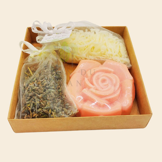 Scentful Sensation, a thoughtful kraft gift box (11 x 11 x 2.5 cm with transparent cover) with 1 soap flower, 1 lavender buds bag, 1 grated soap bag. Handmade in Lebanon.