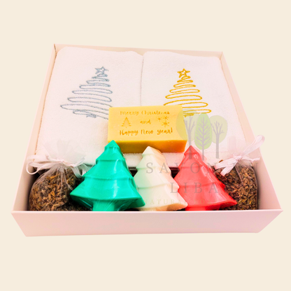 Trésor de Noël Christmas gift set with embroidered towels, Christmas Tree soaps, lavender sachets, and engraved musk soap