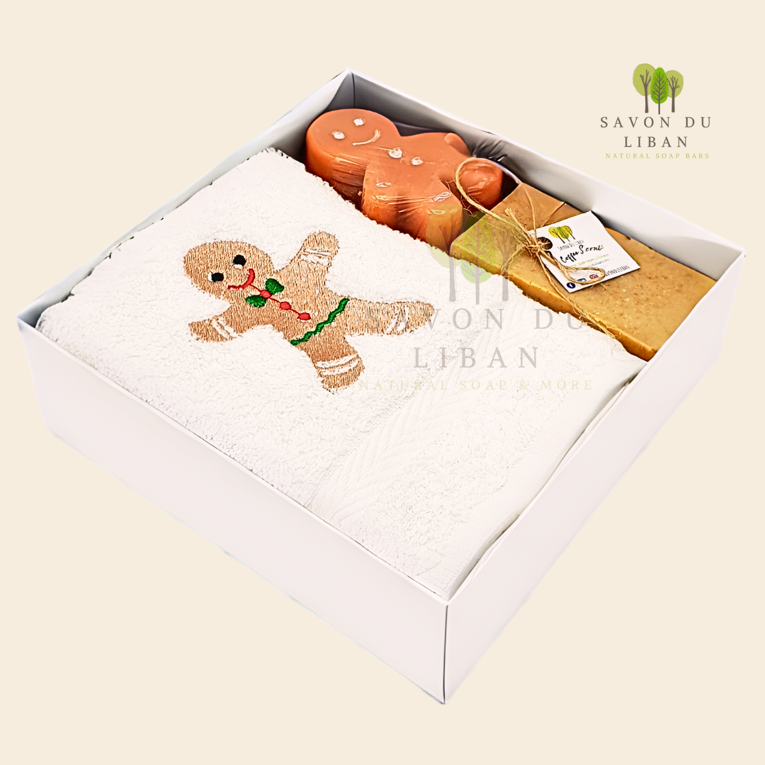 Sweet Gingerbread Gift Set, featuring a 16x16x5 cm white box including an embroidered towel, a soap bar, and a Ginger-breadman-like soap, all handmade in Lebanon.