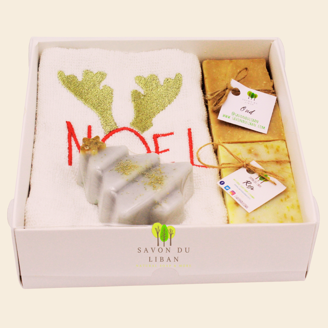 Reindeer Refresh Gift Set with festive NOEL towel and Christmas-themed soaps in an elegant box