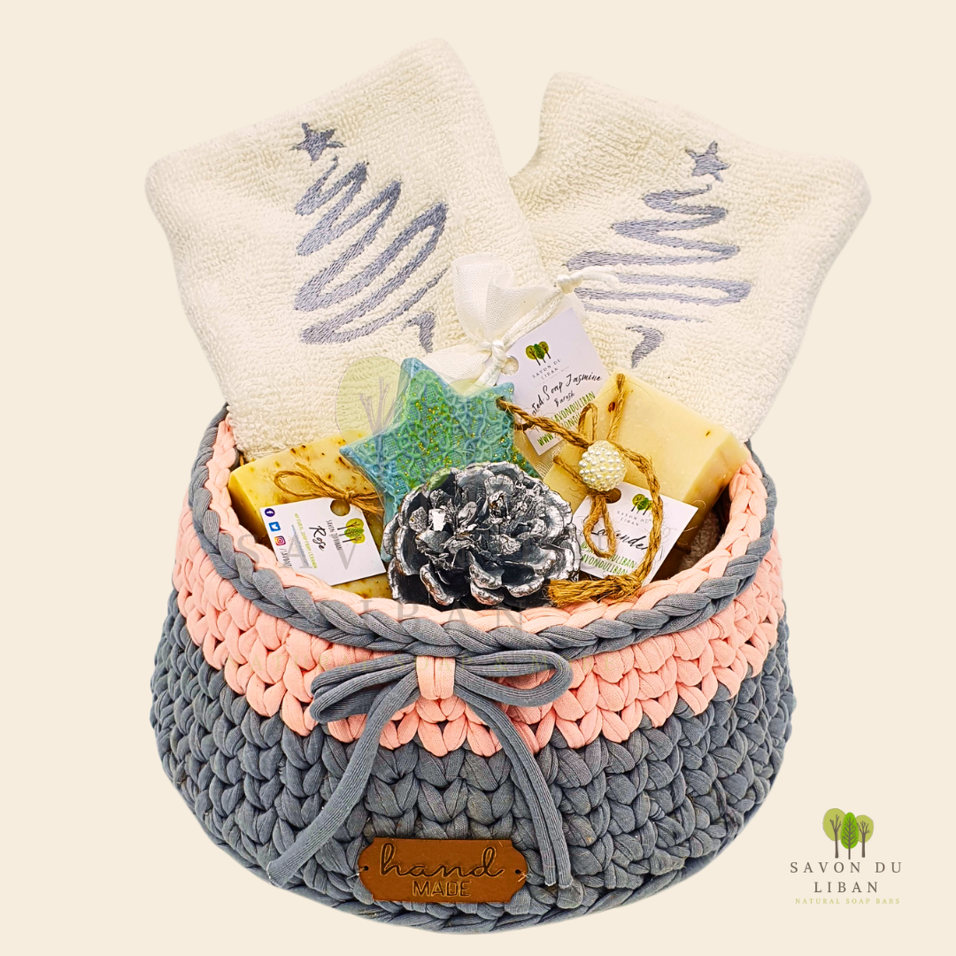 Bowl-la-la Soap & Stitch gift set featuring a crochet basket, embroidered towels, bars of soap, grated soap bag, and festive items, all handmade in Lebanon.