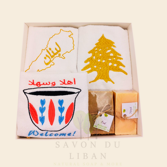 Good Morning from Lebanon – cultural gift set including embroidered towels with Cedar Tree, Lebanon Map, and Coffee Cup Motifs and 2 Handmade Soap Bars in a square white box with transparent lid.