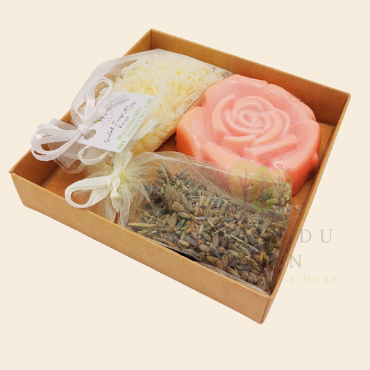 Scentful Sensation, a thoughtful kraft gift box (11 x 11 x 2.5 cm with transparent cover) with 1 soap flower, 1 lavender buds bag, 1 grated soap bag. Handmade in Lebanon.