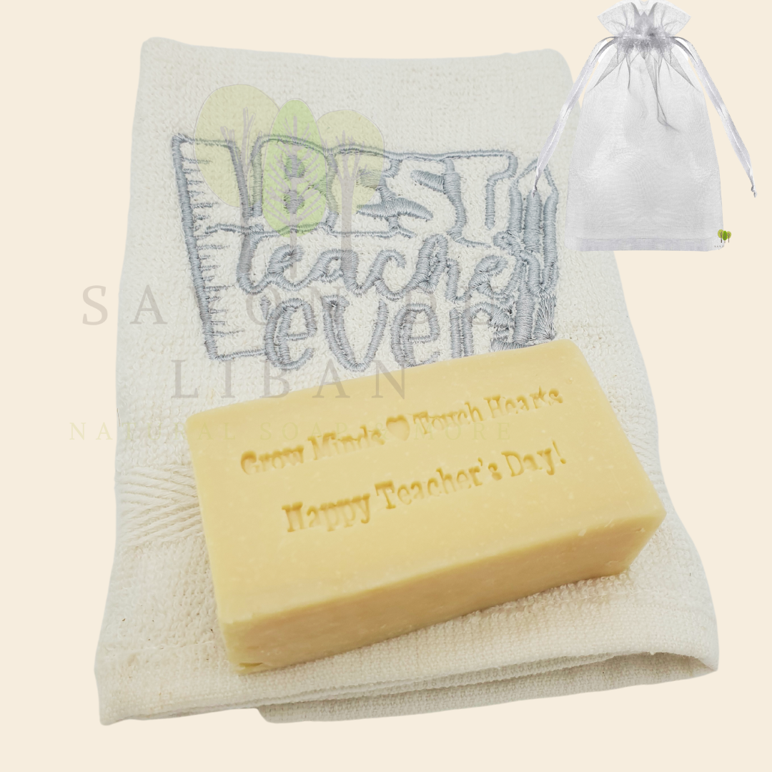 Teacher's Tribute Bag with an embroidered towel, stamped musk soap with the message 'Grow Minds ❤️ Touch Hearts - Happy Teacher's Day!, in an organza bag.