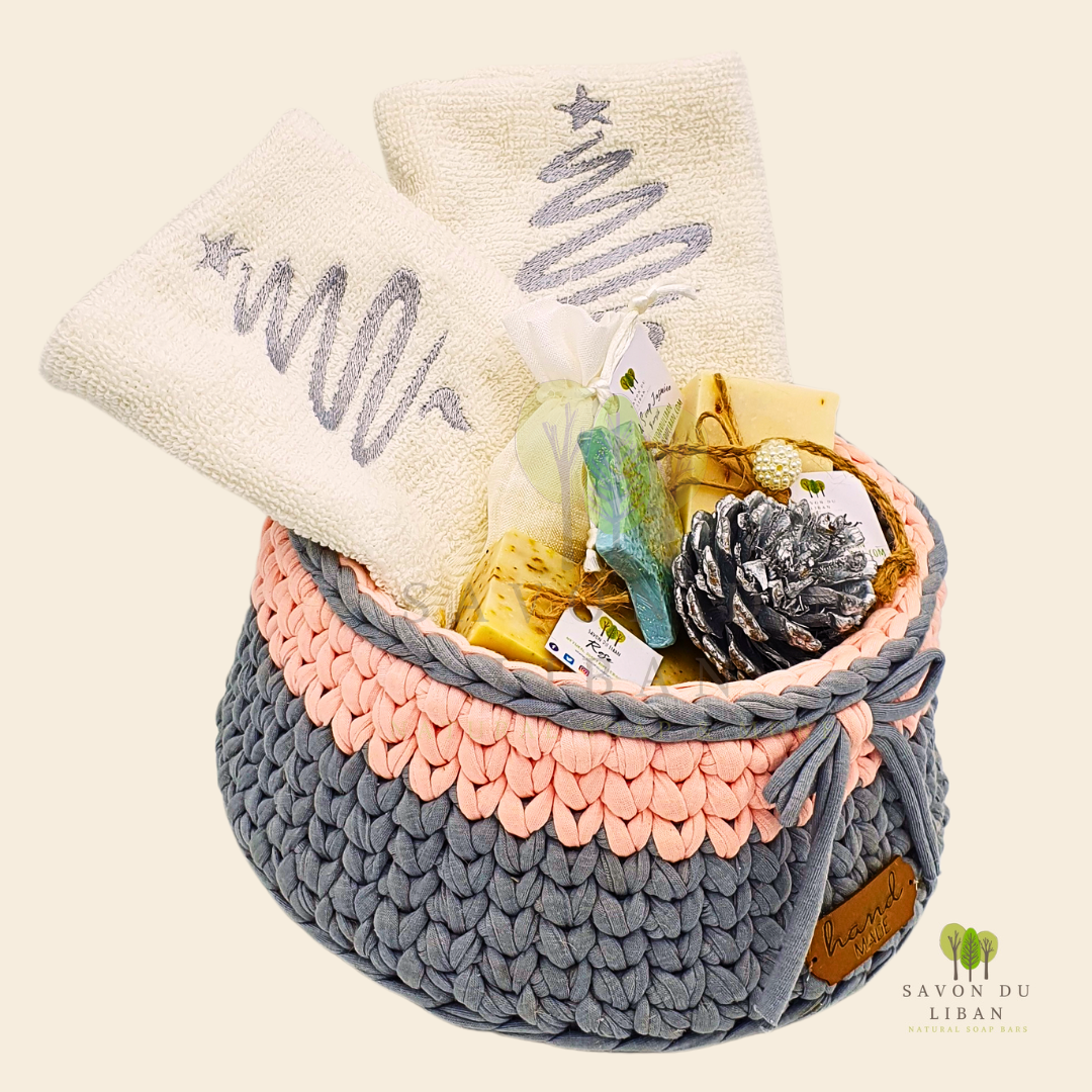 Bowl-la-la Soap & Stitch gift set featuring a crochet basket, embroidered towels, bars of soap, grated soap bag, and festive items, all handmade in Lebanon.