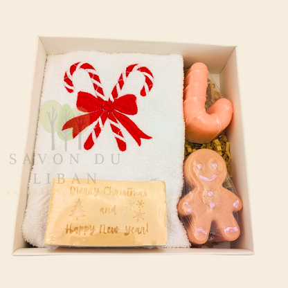 Sugarplum Surprise Handmade Christmas gift box with candy cane and gingerbread soaps and Candy-embroidered Christmas towel