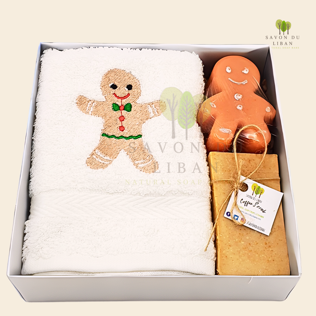 Sweet Gingerbread Gift Set, featuring a 16x16x5 cm white box including an embroidered towel, a soap bar, and a Ginger-breadman-like soap, all handmade in Lebanon.