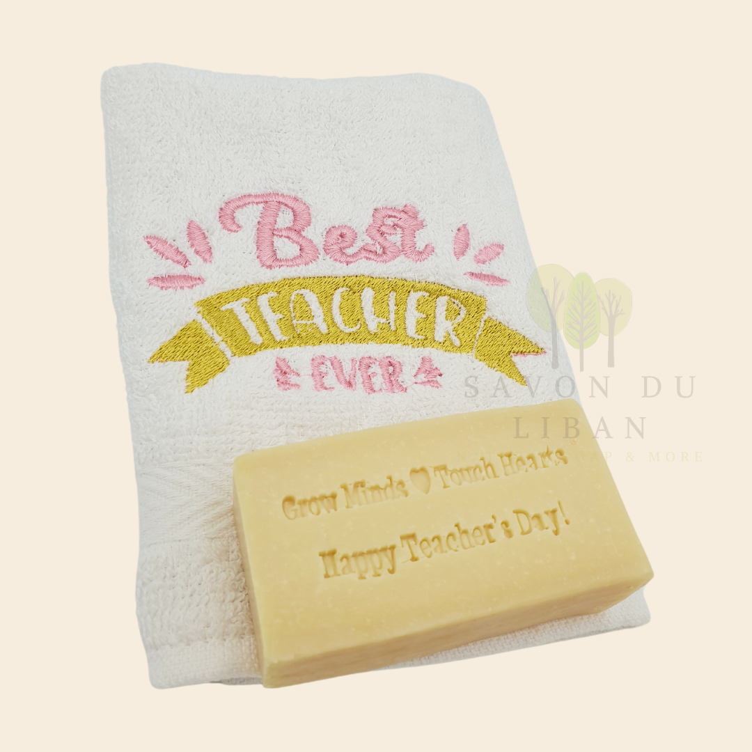 Teacher's Tribute Bag with an embroidered towel, stamped musk soap with the message 'Grow Minds ❤️ Touch Hearts - Happy Teacher's Day!, in an organza bag.