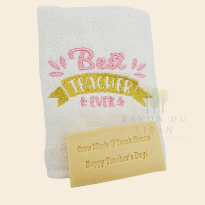 Teacher's Tribute Bag with an embroidered towel, stamped musk soap with the message 'Grow Minds ❤️ Touch Hearts - Happy Teacher's Day!, in an organza bag.