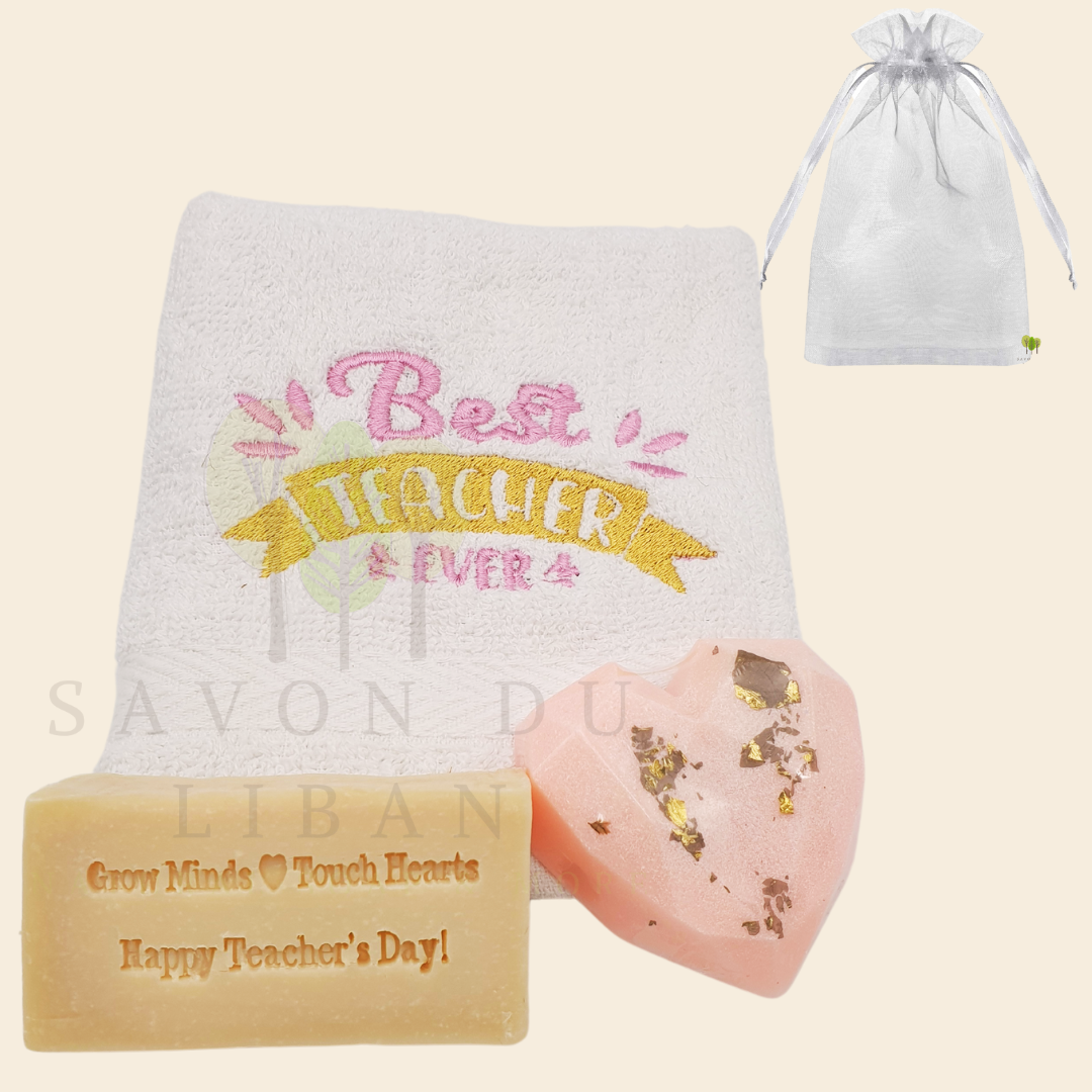 Teacher's Tribute Bag with an embroidered towel, stamped musk soap with the message 'Grow Minds ❤️ Touch Hearts - Happy Teacher's Day!, and optional heart soap in an organza bag.