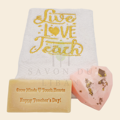 Teacher's Tribute Bag with an embroidered towel, stamped musk soap with the message 'Grow Minds ❤️ Touch Hearts - Happy Teacher's Day!, and optional heart soap in an organza bag.