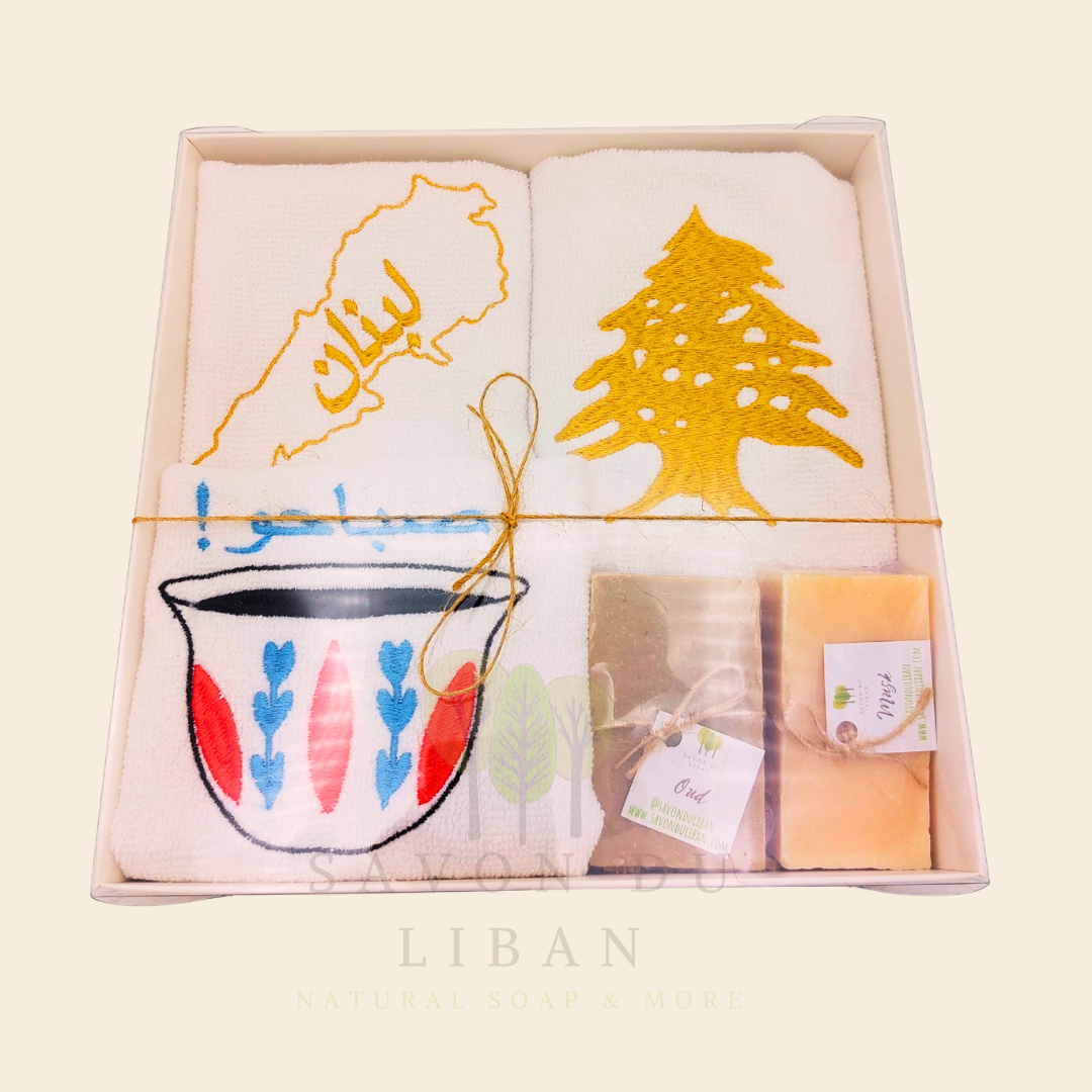 Good Morning from Lebanon – cultural gift set including embroidered towels with Cedar Tree, Lebanon Map, and Coffee Cup Motifs and 2 Handmade Soap Bars in a square white box with transparent lid.