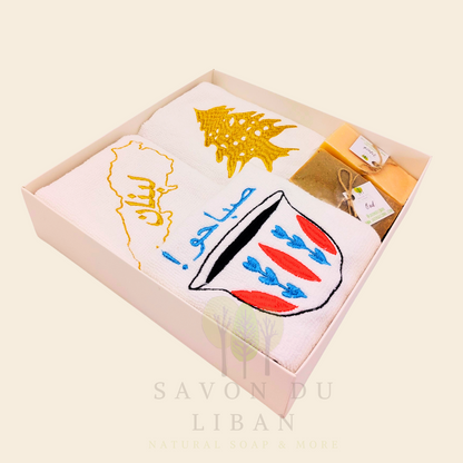 Good Morning from Lebanon – cultural gift set including embroidered towels with Cedar Tree, Lebanon Map, and Coffee Cup Motifs and 2 Handmade Soap Bars in a square white box with transparent lid.
