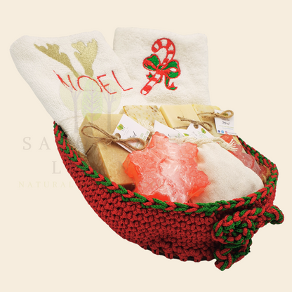 Christmas Stitches of Love, handcrafted red and green crochet platter with festive embroidered towels and artisan soaps like Snowflake and Christmas tree-shaped soaps. 