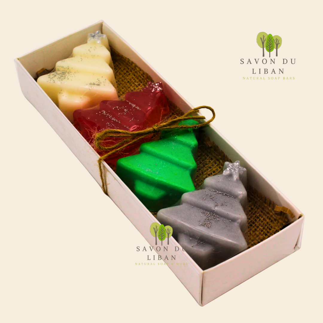 Evergreen Elegance holiday soap set featuring four artisanal Christmas tree soaps.