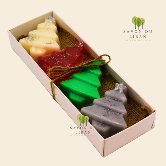 Evergreen Elegance holiday soap set featuring four artisanal Christmas tree soaps.