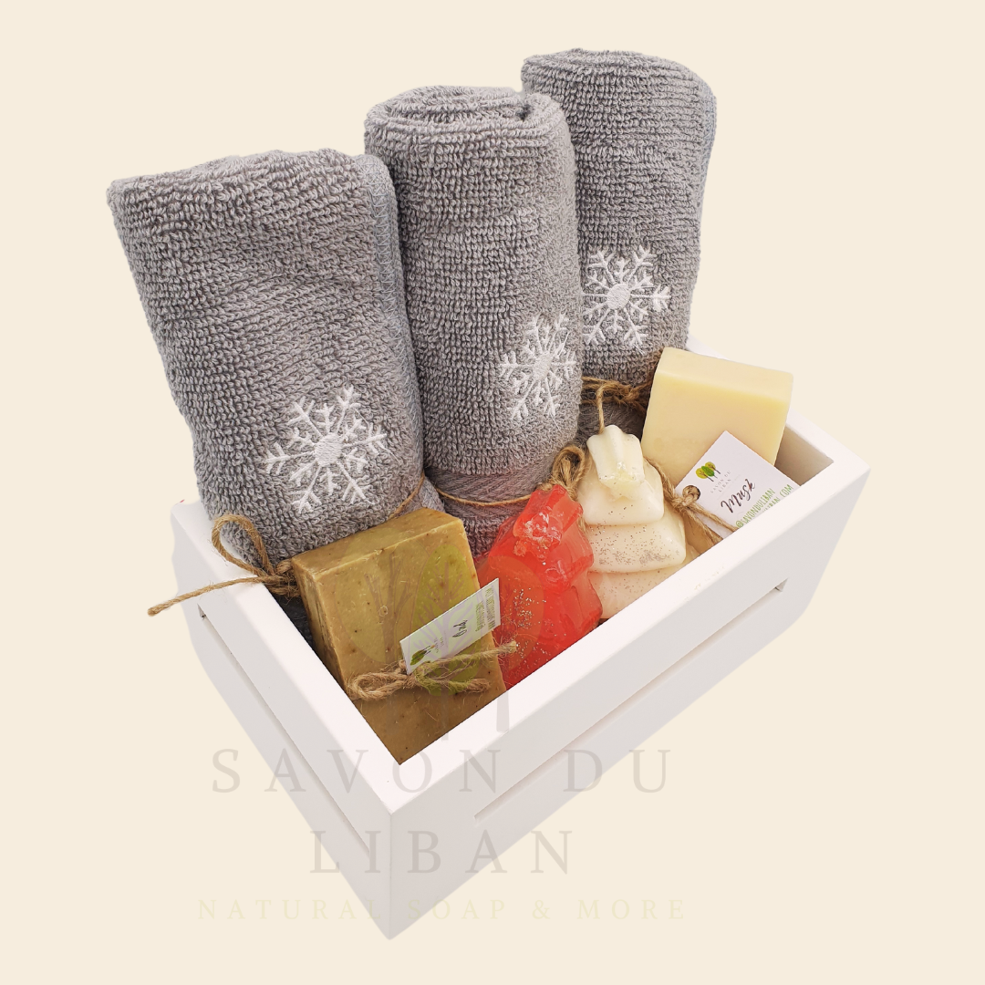 Frosted Treasures Basket made of solid wood, with snowflake-embroidered towels, Christmas tree soaps and soap bars.