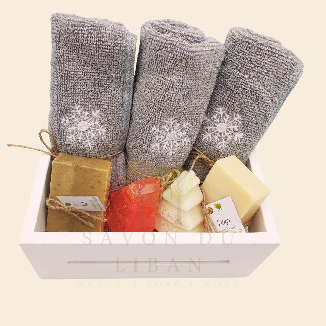 Frosted Treasures Basket made of solid wood, with snowflake-embroidered towels, Christmas tree soaps and soap bars.