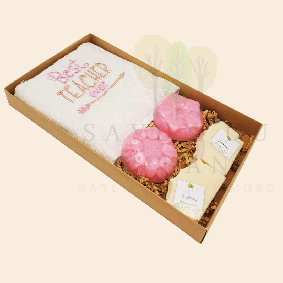 "Petals, Stitches & Bubbles Teacher’s Treat" gift set for Teacher's Day 2025 with embroidered towel and pink flower soaps in a rustic kraft box (30 x 17 x 4 cm).