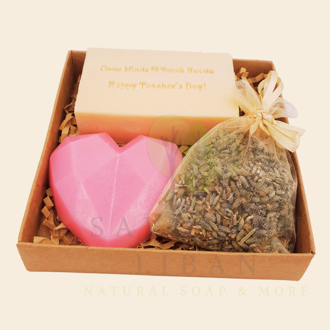 Teacher’s Relax & Enjoy Set – Stamped soap 'Grow Minds ❤️ Touch Hearts - Happy Teacher's Day!', heart soap, and lavender bag in a 11x11x2.5 cm craft box with transparent cover.