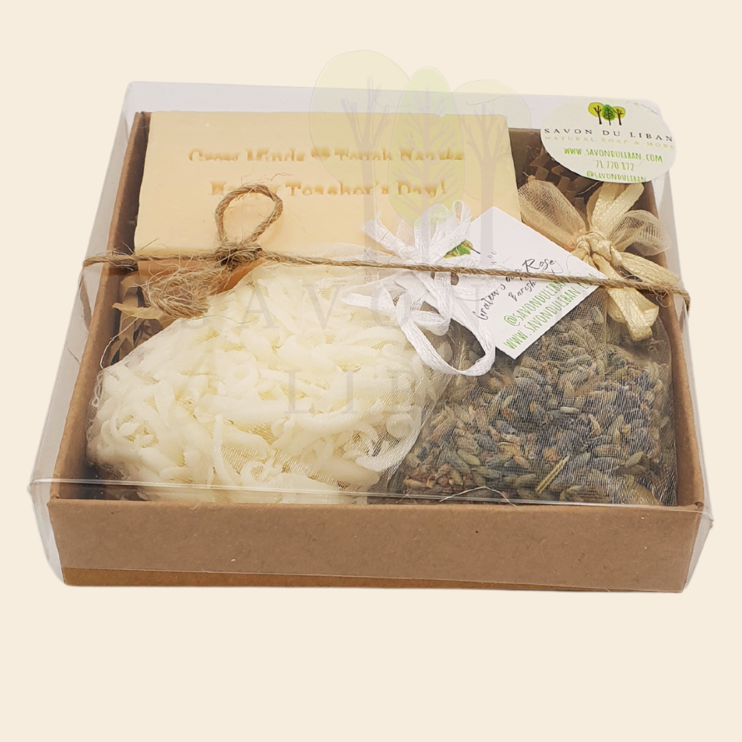 Teacher's Scented Box – Grated soap bag with lavender buds along with musk soap engraved 'Grow Minds ❤️ Touch Hearts - Happy Teacher's Day!' in an elegant 11x11x2.5 cm box with transparent cover.